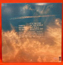 Load image into Gallery viewer, THIRTY SECONDS TO MARS - IT'S THE END OF THE WORLD, BUT IT'S A BEAUTIFUL DAY LP - BRIGHT ORANGE VINYL - SIGNED/ AUTOGRAPHED
